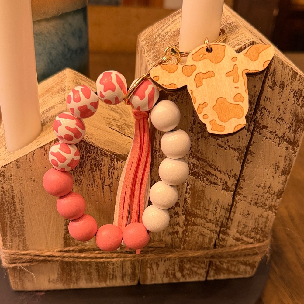 Pink and White Beaded Keychain with Tassel and Cow Charm